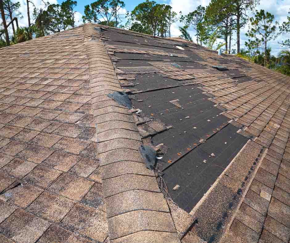 a house in Ottawa with many missing shingles needing roof repair services