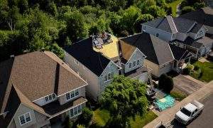 Vanity roofing team installing a residential shingle roof in Ottawa