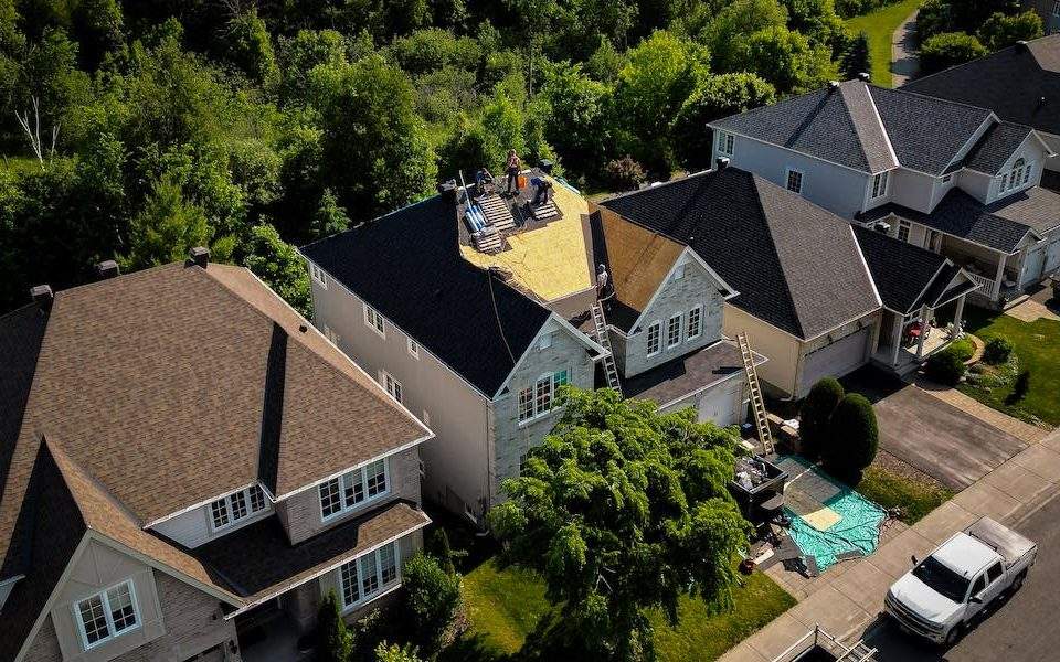 Vanity roofing team installing a residential shingle roof in Ottawa
