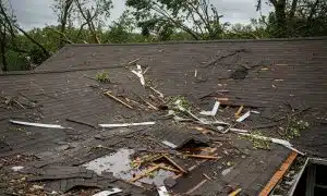 a damaged roof in ottawa after a severe storm