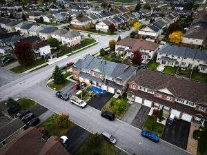 Arial view of a Vanity Roofing team installing a residential roof in Ottawa