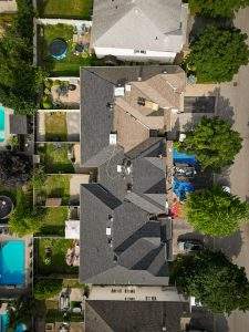 Arial view of a Vanity Roofing team installing a new roof in Ottawa