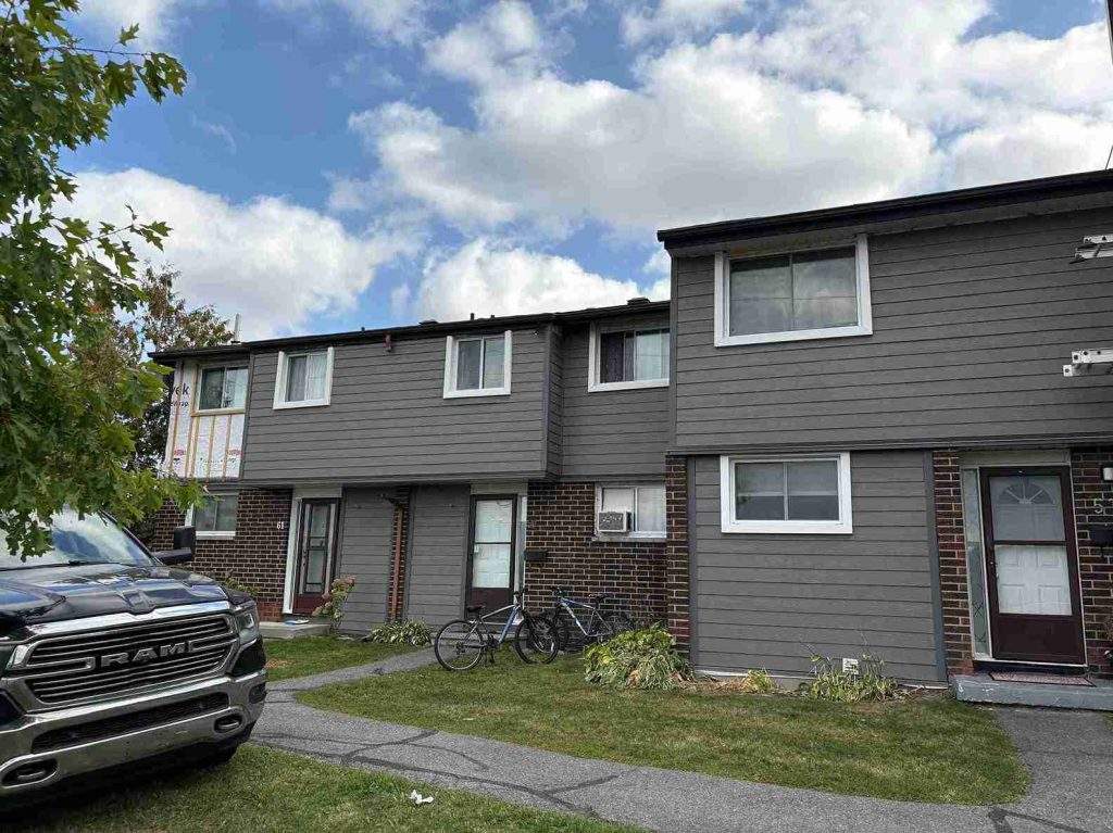 Ottawa wood siding installation project in progress by Vanity Roofing