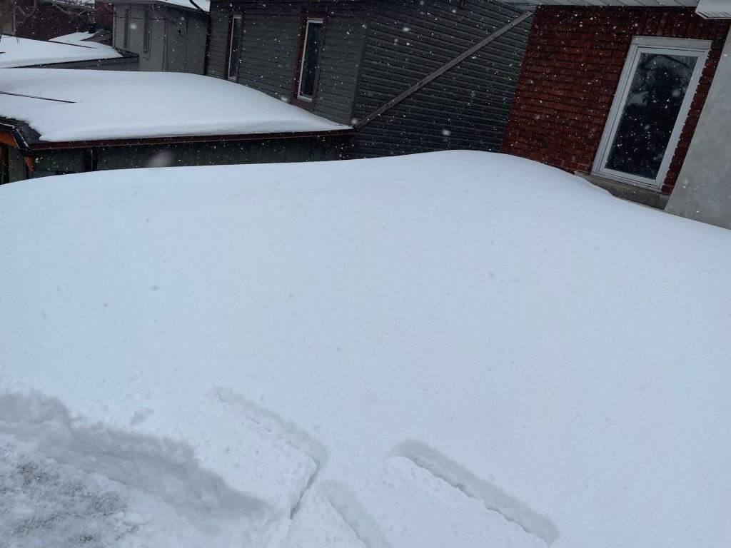 snow removal ice damming roofing in ottawa