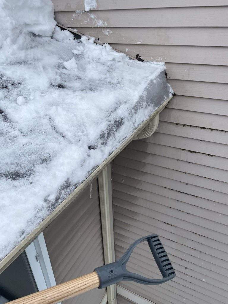 snow removal ice damming roofing in ottawa
